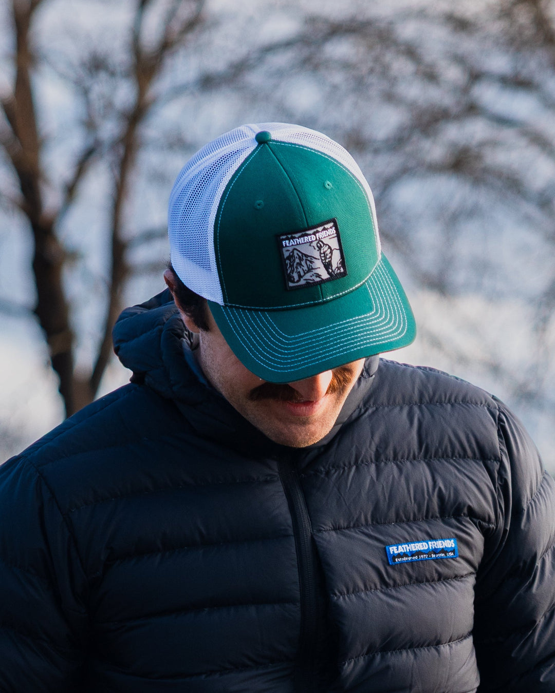 Feathered Friends Smoking Man Pro Style Trucker Hat