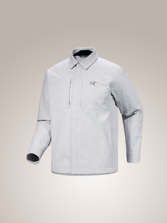 Solitude light gray Arc'teryx Cronin insulated men's overshirt on a beige background