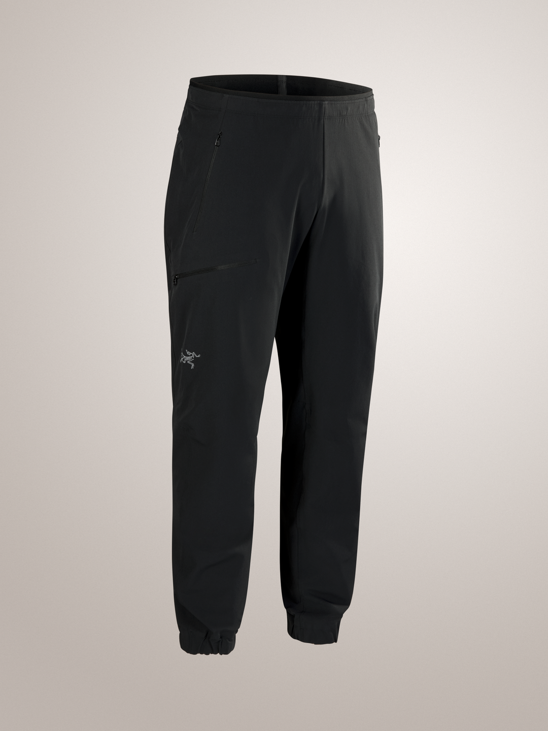 Black Arc'teryx Gamma Jogger pants with a brand logo on a light gray background