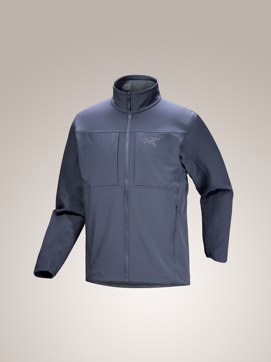 Men's Arc'teryx Gamma MX Jacket in dark blue, a stretch woven softshell with full zip and chest pockets.