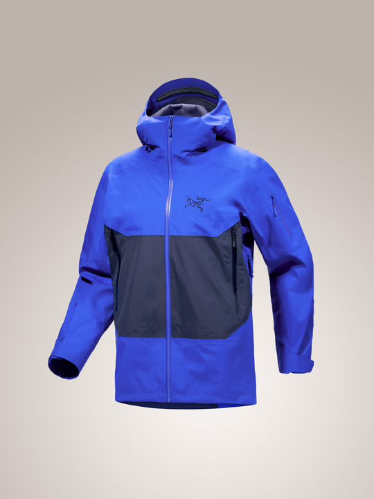 Vitality blue and Black Sapphire Arc'teryx Sabre jacket with a brand logo on a light gray background