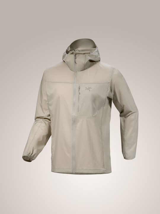 Men's Squamish Hoody in light tan, a lightweight nylon windshirt with a hood, chest pocket, and full zipper.