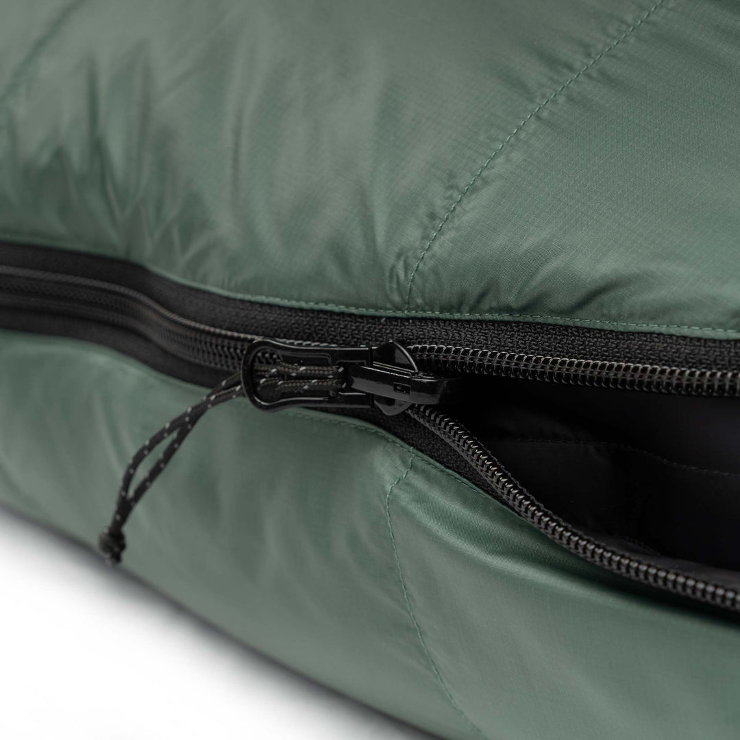 Fir green Feathered Friends Puffin Down Sleeping Bag zipper detail