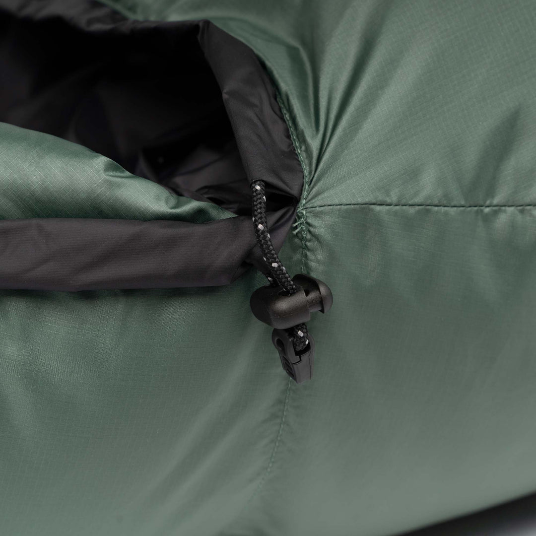 Fir green Feathered Friends Puffin Down Sleeping Bag draw cord toggle detail