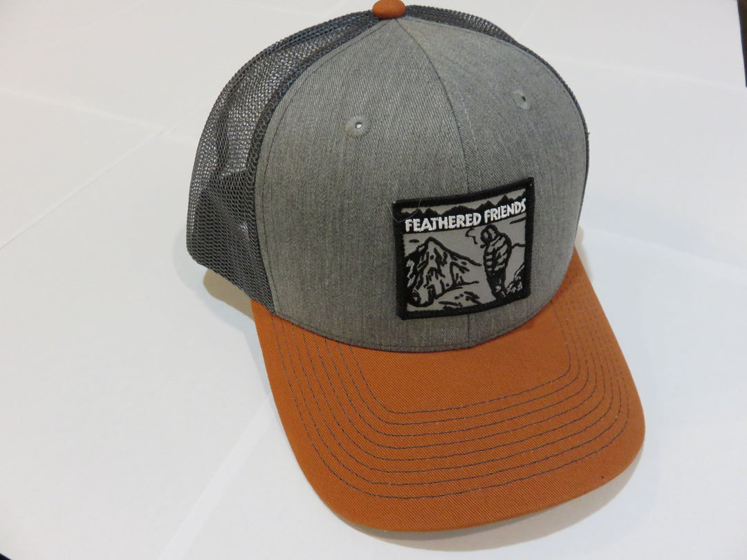 Kam Gear-Feathered Friends Smoking Man Pro Style Trucker Hat-Clothing-Heather Grey/Burnt Orange/Charcoal-