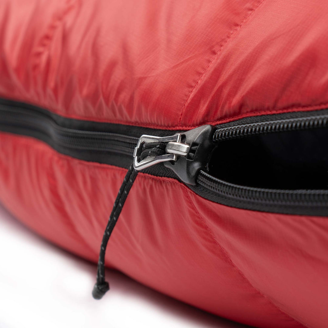Cardinal red Feathered Friends YF down sleeping bag zipper guard detail