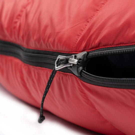 Cardinal red Feathered Friends YF down sleeping bag zipper guard detail