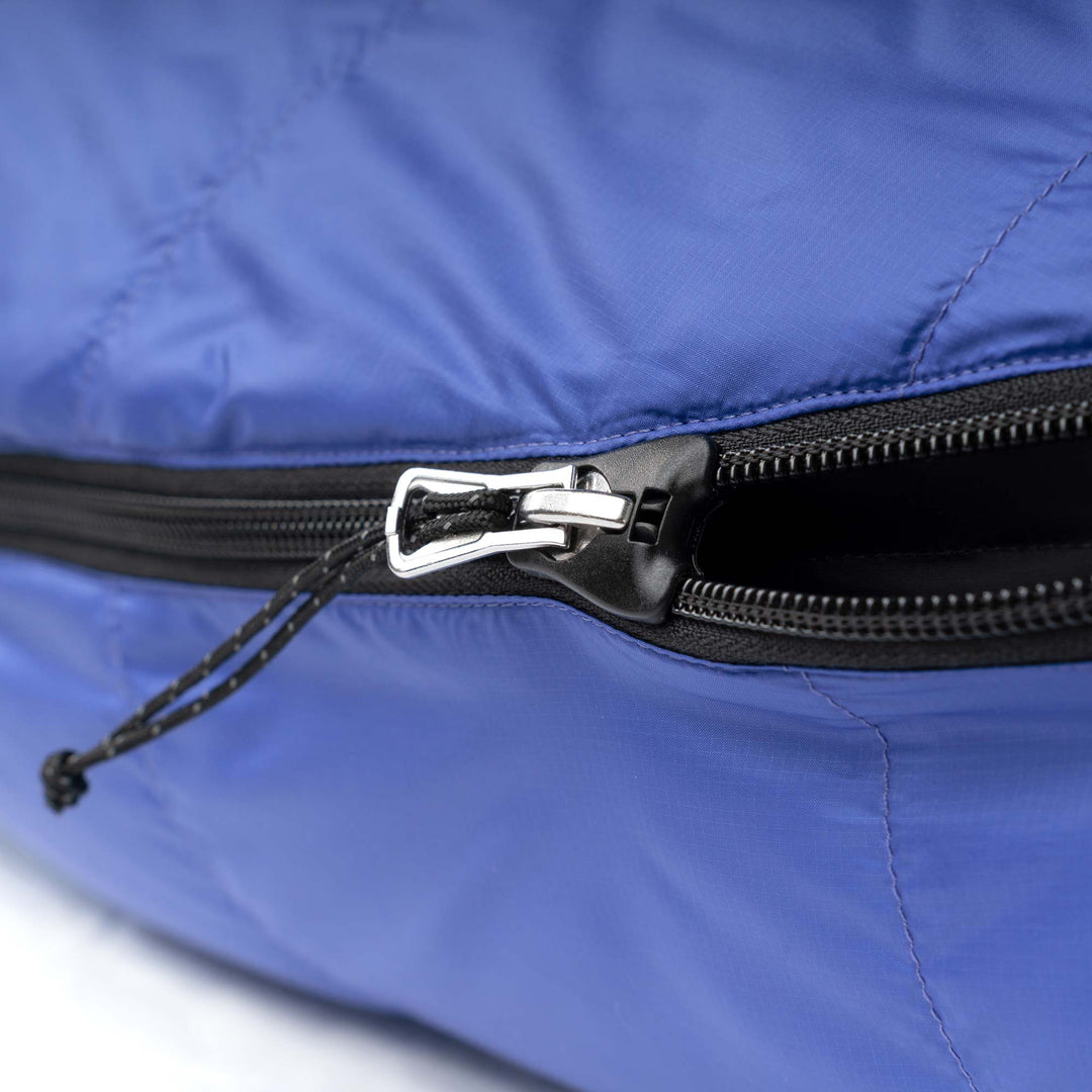 Marine blue Feathered Friends YF sleeping bag zipper guard detail