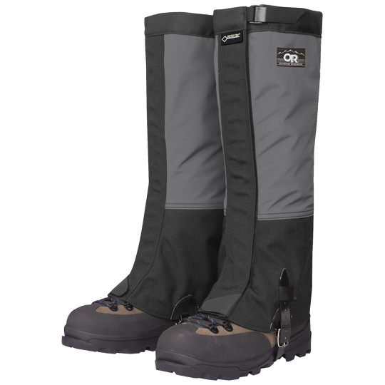Pair of black and gray Outdoor Research Crocodile classic gaiters with a brand logo on a white background